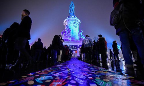People commemorate victims of the terrorist attack against Charlie Hebdo in 2015 during a commemoration at the Place of the Republic in Paris, France, on Jan. 7, 2016.Photo: Xinhua