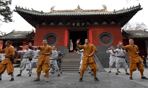 Monks practice martial arts at Shaolin Temple in central China's Henan Province, Jan. 20, 2017. Photo:Xinhua