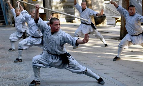 A monk practices martial arts at Shaolin Temple in central China's Henan Province, Jan. 21, 2017. Photo:Xinhua