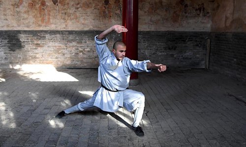 An Indian monk practices martial arts at Shaolin Temple in central China's Henan Province, Jan. 21, 2017. Shaolin Temple is located at Songshan Mountain in Henan. Photo:Xinhua