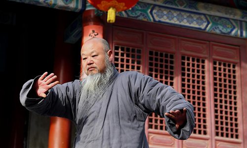 A monk practices martial arts at Shaolin Temple in central China's Henan Province, Jan. 21, 2017. Photo:Xinhua