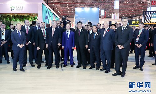 Xi, foreign leaders tour CIIE exhibition hall