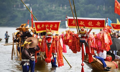 Miao people celebrate dragon canoe festival in China's Guizhou