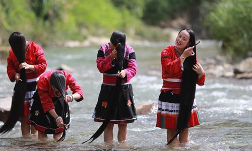 Women of Yao ethnic group have tradition of keeping long hair - Global Times