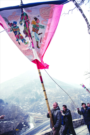 4. One of the flag bearers of the fanhui festivities, which took place this past Sunday and Monday. 
