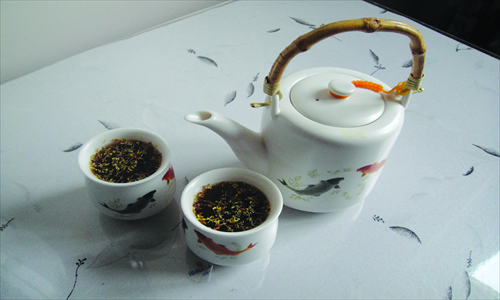 A pot of dark plum soup Photo: Wei Xi/GT