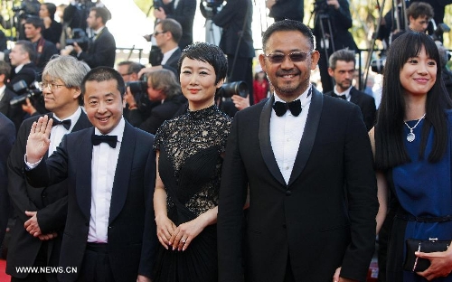 Chinese director Jia Zhangke (L front) of the film 
