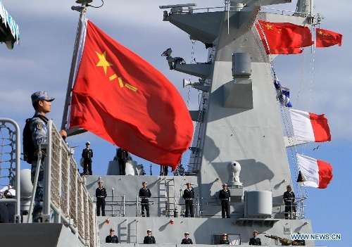 Chinese naval soldiers stand on the frigate at the habour of Algiers, Algeria, on April 2, 2013. The 13th naval escort squad, sent by the Chinese People's Liberation Army (PLA) Navy, arrived at Algiers of Algeria on Tuesday for a four-day visit after finishing its escort missions. (Xinhua/Mohamed Kadri) Related:China Navy kicks off visit to AlgeriaALGIERS, April 2 (Xinhua) -- The 13th Escort Taskforce of the Chinese Navy arrived Tuesday in Algiers, capital of Algeria, beginning a four-day visit to the country.The visit by the escort taskforce, composed of two frigates and one supply ship, is the first of its kind made to the nation by a Chinese naval fleet, said Li Xiaoyan, commander of the escort taskforce. Full story