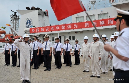 A ceremony is held by the Hainan Maritime Safety Administration in Haikou, capital of south China's Hainan Province, April 3, 2013. A fleet of five marine surveillance ships will monitor maritime traffic safety, investigate maritime accidents, detect pollution, and carry out other missions around the clock during the Boao Forum for Asia Annual Conference 2013 in Hainan. (Xinhua/Shi Manke)  