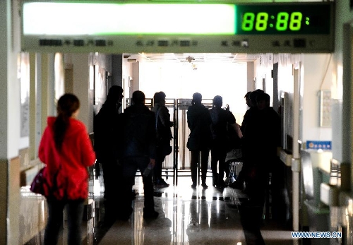 Relatives of injured coal miners wait in a hospital in Baishan, northeast China's Jilin Province, March 30, 2013. Twenty-eight people were confirmed dead and 13 others injured in a gas blast at Babao Coal Mine in Jiangyuan District in the city of Baishan around 10:40 p.m. (1440 GMT) late Friday. The injuries of the 13 were not life threatening, said a spokesman with the provincial work safety and supervision bureau. Rescue work has been finished, and the cause of the accident is under investigation. (Xinhua/Xu Chang)