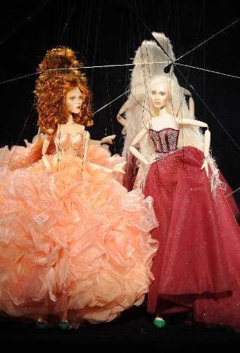 Marionettes present creations of FH por Fause Haten during Sao Paulo Fashion Week at FAAP Theater in Sao Paulo, Brazil, March 20, 2013. The Sao Paulo Fashion Week Summer 2013/14 lasts from March 18 to 22. (Xinhua/Weng Xinyang)&nbsp; 
