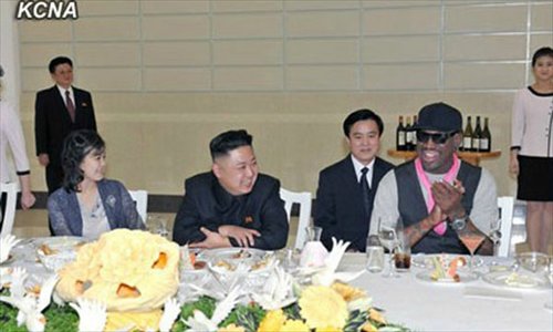 Kim Jong-un (center) is talking with Rodman at the dinner on February 28, 2013. His wife Ri Sol Ju is seated on his left.Photo: KCNA