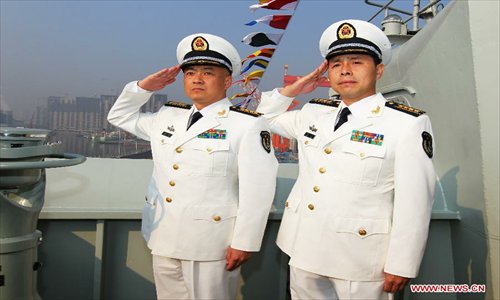 Zhang Zheng (L), captain of China's first aircraft carrier 