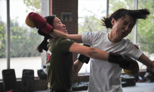 Women bodyguards boxing. Photo: Yang Yifan/Tencent News