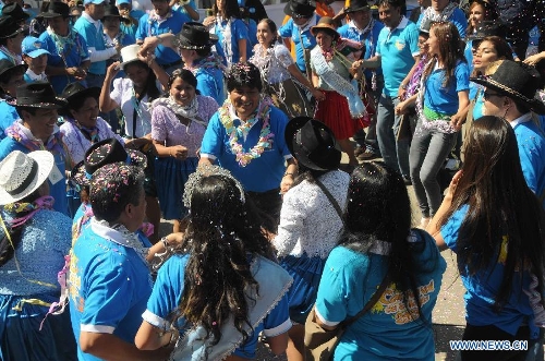 Bolivia's President Evo Morales (C) participates in the celebration of the 
