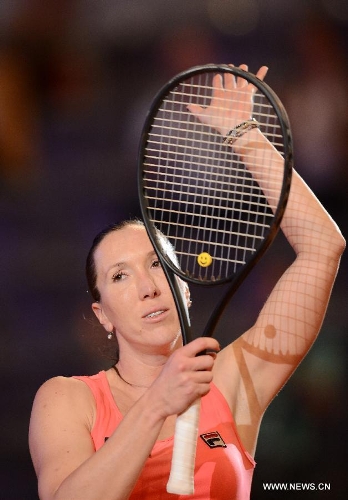 Jelena Jankovic of Serbia greets the audience during the first round match of Porsche Tennis Grand Prix against Samantha Stosur of Austrilia in Stuttgart, Germany, on April 24, 2013. Jelena Jankovic won 2-0. (Xinhua/Ma Ning) 