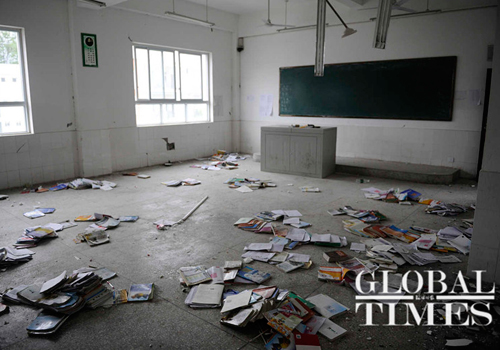 Students’ books are left on the ground in a classroom of the Lingguan Middle School in Baoxing county. Photo: Li Hao/GT

