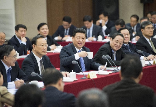  Xi Jinping (C), general secretary of the Central Committee of the Communist Party of China (CPC) and Chairman of the CPC Central Military Commission, visits members of the 12th National Committee of the Chinese People's Political Consultative Conference (CPPCC) from the science and technology sector and joins their panel discussion in Beijing, capital of China, March 4, 2013. Yu Zhengsheng, a Standing Committee member of the Political Bureau of the CPC Central Committee, who is also the executive chairperson of the presidium of the first session of the 12th CPPCC National Committee, also attended the activity. (Xinhua/Li Xueren)