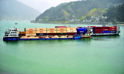 Several cargo ships anchor downstream of the Three Gorges Dam in Yichang, Hubei Province. From January to April, China has invested 14.1 billion yuan ($2.3 billion) in inland waterway construction, up 21.2 percent year-on-year, according to media reports Monday. Photo: CFP