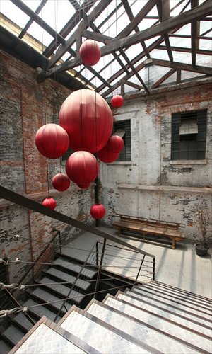 Red lanterns hanging at the entrance to the River South Art Space
