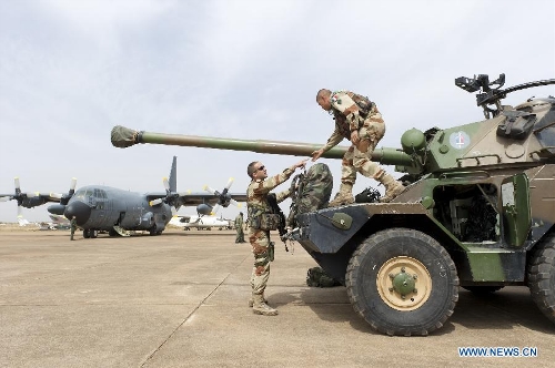 Photo released by the French Defense Ministry shows French soldiers getting prepared at the Bamako military airport as part of the 