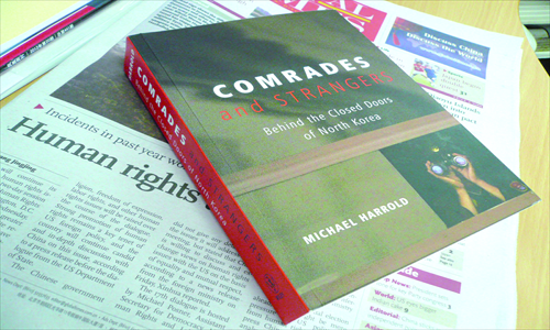 Inset: The cover of his book Comrades and Strangers Photo: GT