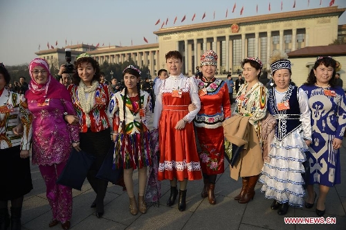 Deputies to the 12th National People's Congress (NPC) pose for a photo in front of the Great of the People in Beijing, capital of China, March 5, 2013. The first session of the 12th National People's Congress (NPC) will open at the Great Hall of the People in Beijing on March 5. (Xinhua/Wang Peng) 