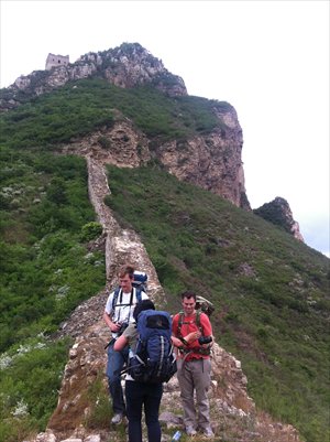 Intrepid campers, led by a professional, prepare to hike the trail up to their home for the night, a Ming-era watchtower. Camping along Beijing's Great Wall stretches and mountain ranges is gaining new followers lately. Photo: Jiang Yuxia/GT
