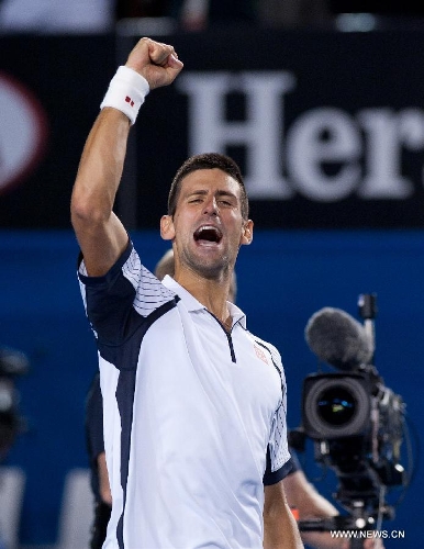 Novak Djokovic of Serbia reacts after winning his men's singles quarterfinals match against Tomas Berdych of Czech Republic at 2013 Australian Open tennis tournament in Melbourne, Australia, Jan. 22, 2013. Novak Djokovic won 3-1. (Xinhua/Bai Xue) 