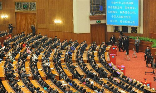 The sixth plenary meeting of the first session of the 12th National People's Congress (NPC) is held at the Great Hall of the People in Beijing, capital of China, March 16, 2013. 