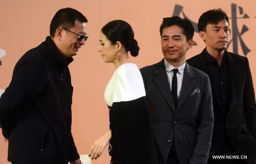 Hong Kong director Wong Kar Wai (L) and cast members Zhang Ziyi, Tony Leung and Chang Chen (2nd L to R) attend the premiere ceremony of Wong's new film 