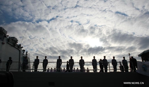 The frigate Huangshan of the 13th naval escort squad sent by the Chinese People's Liberation Army (PLA) Navy arrives at the Toulon harbour in France, April 23, 2013. The 13th convoy fleet including the frigates Huangshan and Hengyang and the supply ship Qinghaihu arrive in Toulon, France on Tuesday, beginning a five-day visit to the country. (Xinhua/Gao Jing) 