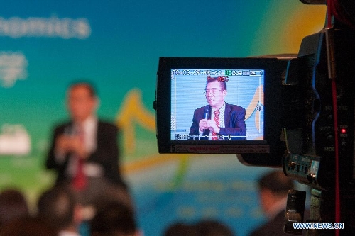 Former Chief Economist and Senior Vice President of the World Bank Lin Yifu, who is also the honorary director of the National School of Development of Peking University, speaks on a Boao Dialogue on new structural economics during an annual meeting of the Boao Forum for Asia in Boao, south China's Hainan Province, April 6, 2013. (Xinhua/Xu Zijian) 