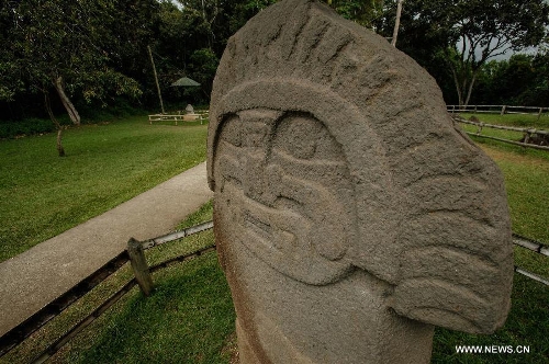 An sculpture is showed at San Agustin Archaeological Park in Huila, Colombia, on March 31, 2013. San Agustin Archaeological Park is located in the southern Colombian Department of Huila, which will celebrate its centenary and being denominated as World Cultural Heritage in 1995 by United Nations Educational, Scientific and Cultural Organization (UNESCO) this year. (Xinhua/Jhon Paz)