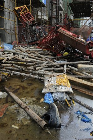 At least 19 people were killed after a lift crashed from the 30th floor of a building that is under construction in Central China's Hubei Province. An investigation is underway. Photo: CFP