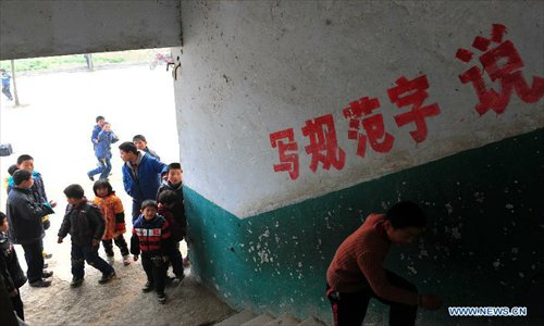 Photo taken on Feb. 27, 2013 shows the scene of a stampede accident at the Qinji Elementary School in Xueji County of Xiangyang, central China's Hubei Province. Four students were killed in a stampede accident here on Wednesday morning. Relevant departments of Xiangyang have rushed to the scene to carry out rescue efforts, and the injured have been sent to hospital for treatment. The cause of the accident is under investigation. Photo: Xinhua
