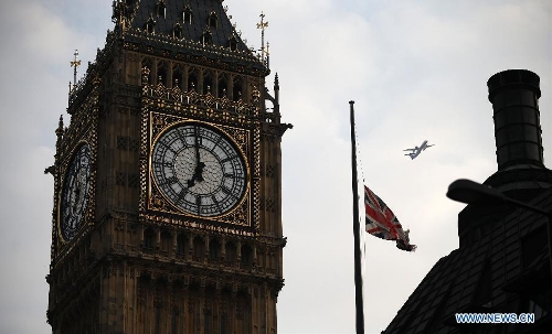 The Union Flag flies at half mast over Portcullis House following the death of former British Prime Minister Baroness Margaret Thatcher in London, Britain, on April 8, 2013. It has been confirmed that Lady Thatcher died this morning following a stroke at the age of 87. (Xinhua/Wang Lili) 