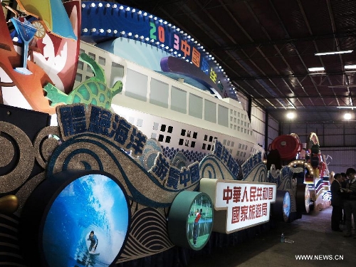 A China National Tourism Administration float which will attend the 2013 Cathay Pacific International Chinese New Year Night Parade is displayed at a press preview in south China's Hong Kong, Feb. 4, 2013. The 2013 Cathay Pacific International Chinese New Year Night Parade will take place in Hong Kong on Feb. 10. (Xinhua/Li Ying)&nbsp; 