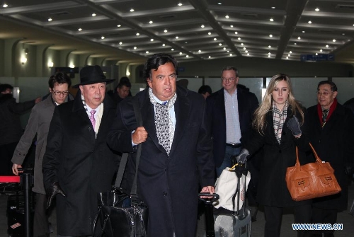  U.S. Former New Mexico state governor Bill Richardson (3rd L) and Google Executive Chairman Eric Schmidt (3nd R) arrive at Sunan airport of Pyongyang, the Democratic People's Republic of Korea (DPRK), on Jan. 7, 2013. Bill Richardson and Eric Schmidt arrived here on Monday for a 