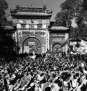 Red Guards gather in front of a temple in Harbin, Heilongjiang Province on August 24, 1966, with banners blasting words like 