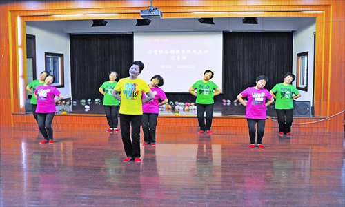 Members of the Danqing Single Mothers' Club perform to celebrate the club's 10th anniversary in November, 2011. Photo: Courtesy of the club