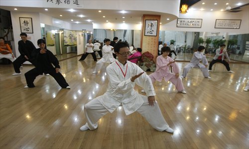 Tai Chi is believed to help strengthen the body and facilitate the rehabilitation of patients. Photos: Cai Xianmin/GT and courtesy of jiyuntaichi.com