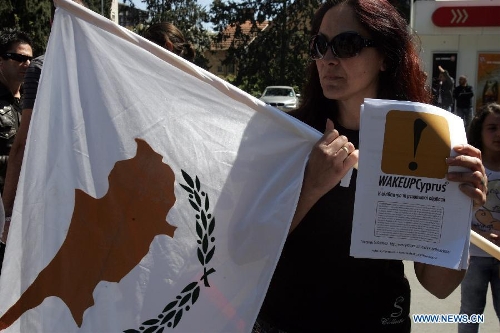 Cypriots parade in Nicosia on March 25, 2013, to mark the 192nd anniversary of Greece's Independence Day, hours after Eurozone ministers approved a new bailout plan for Cyprus. With about 80 percent of its population being Greek Cyprus, Cyprus and Greece enjoy extremely close relationship. (Xinhua/Marios Lolos) 