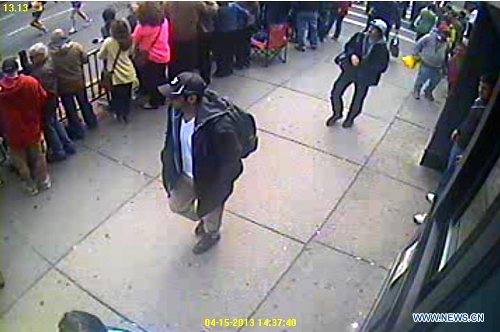 Photo released by the U.S. Federal Bureau of Investigation (FBI) in Boston on April 18, 2013 shows two Boston bombing suspects. The FBI special agent Richard DesLauriers on Thursday released the photos and video of two suspects of Monday's deadly bombings in Boston, asking for the public's help to identify them. (Xinhua/FBI) Related:FBI releases photos of 2 Boston bombings suspectsBOSTON, the United States, April 18 (Xinhua) -- The FBI special agent Richard DesLauriers on Thursday released the photos and video of two suspects for Monday's deadly bombings in Boston, asking for the public's help to identify them.Speaking at the news conference in Boston, DesLauriers said it was the 