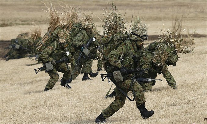 Japan's Self-Defense Forces (SDF) launched a military drill on island defense in a training ground in the city of Narashino in Chiba Prefecture on January 13, 2012.Photo: chinanews.com