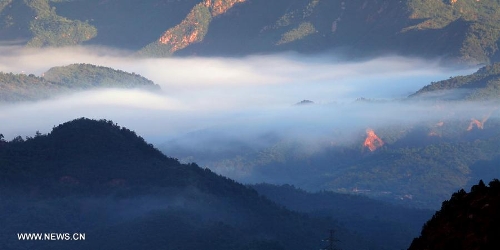 Photo taken on July 3, 2013 shows the scenery of the mountainous areas in Liulimiao Village of Huairou District, Beijing, capital of China. (Xinhua/Bu Xiangdong)