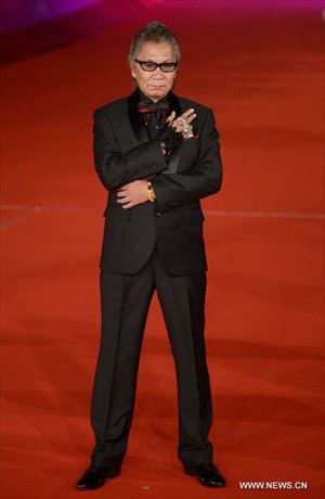 Japanese director Takashi Miike poses on the red carpet of the 7th Rome Film Festival in Rome, Italy, Nov. 9, 2012. The 7th Rome Film Festival opened here late Friday. Photo: Xinhua