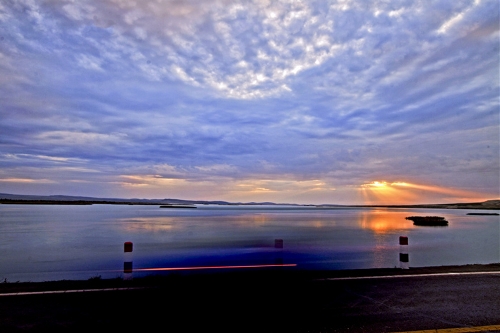 BEIJING,&nbsp;June 27&nbsp;(Xinhuanet) -- Located in the Altai Mountains, northeast of Fuyun County in Xinjiang, Koktokay Scenic Spot, or Koktokay National Geopark, is an ideal place for sightseeing, vacationing, hiking, photographing and scientific expedition. It is the origin of the Irtysh River, which is the only river in China flowing into the Arctic Ocean. Near the river is the 