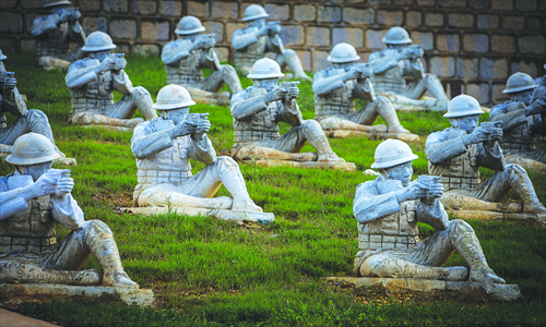 Sculptures of CEF soldiers are displayed at the memorial park on Songshan Mountain. Photo: IC