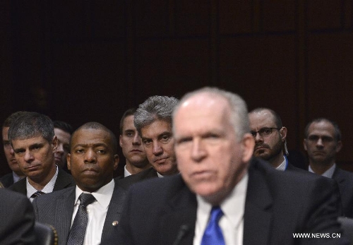 CIA Director John Brennan testifies before the Senate Select Intelligence Committee during a hearing on 